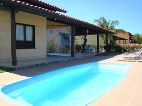 Casa espetacular em condomínio pé-na-areia, PZ11